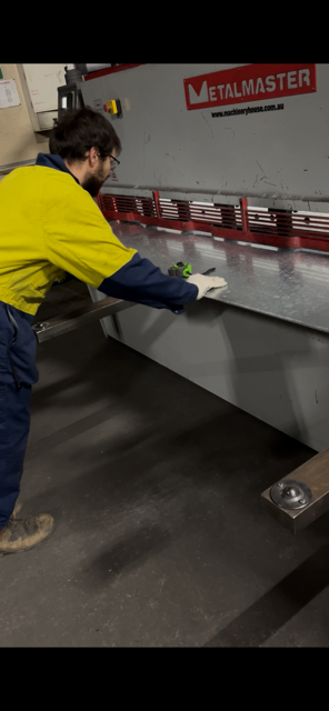 Galvanised steel sheet being prepared for a Gaga Pit Kits Australia bracket