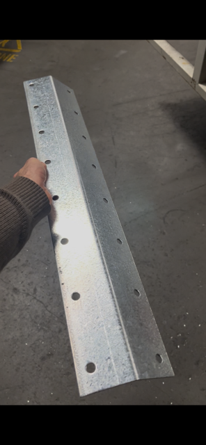 Outside face of a finished galvanised bracket in the factory