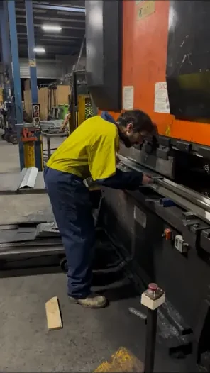 Folding a galvanised corner bracket on a brake press