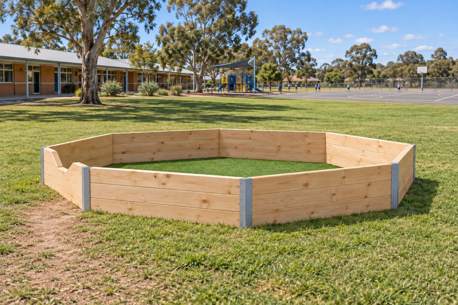 A 60 cm gaga pit with artificial turf inside, on a school oval with a worn path where students walk in and out